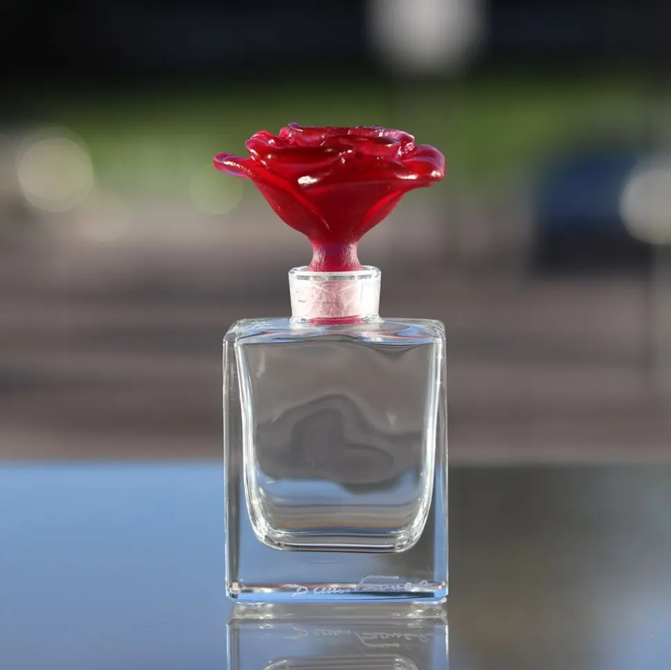 Flacon de parfum rose framboise daum