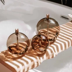 Lampe à huile sphère verre couleur champagne